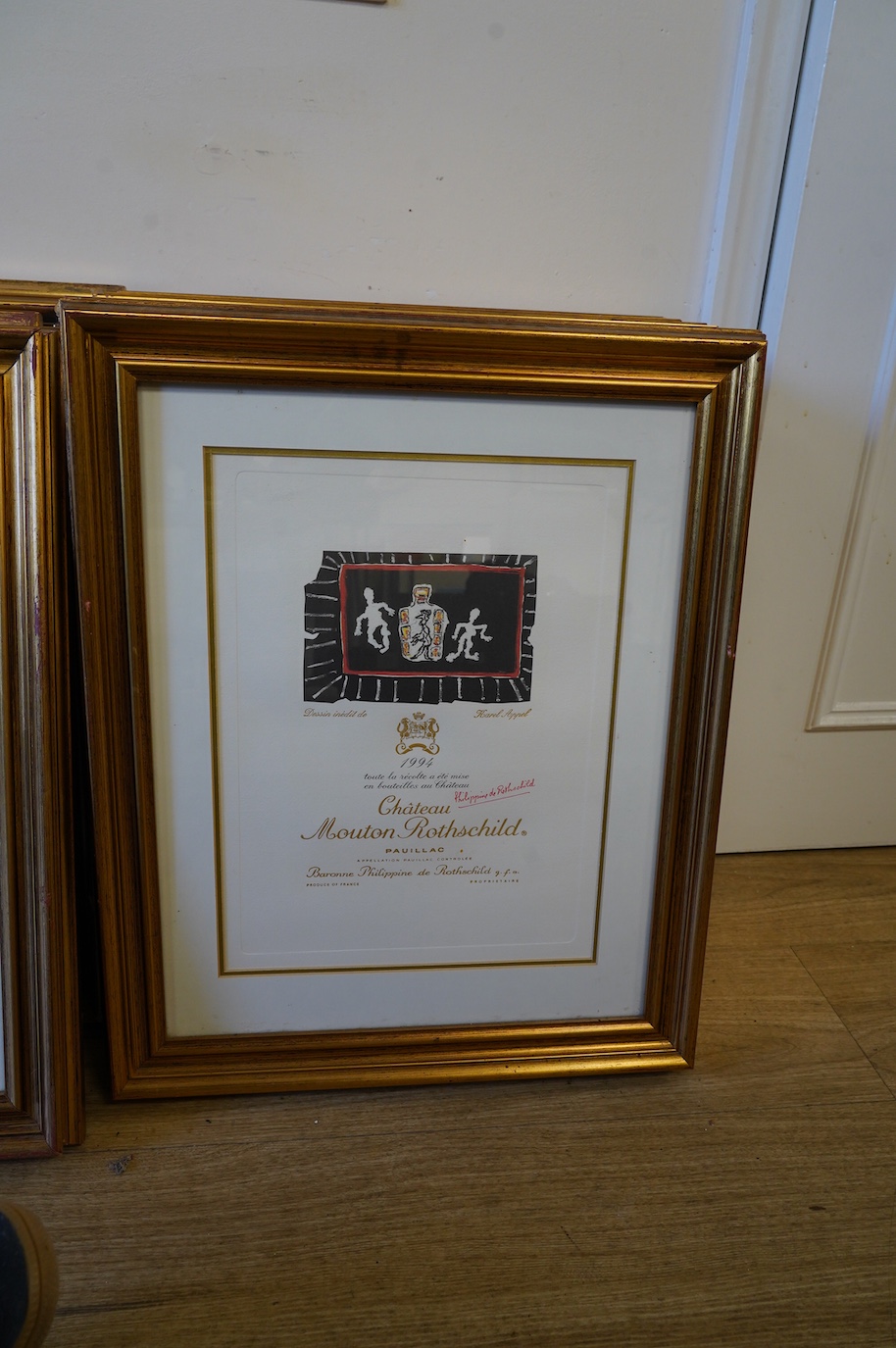 A set of fifteen Mouton Rothschild vintage wine label prints, framed, each 35 x 26cm. Condition - good